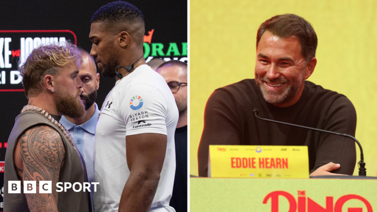 Francis Ngannou falls as he is punched by Anthony Joshua