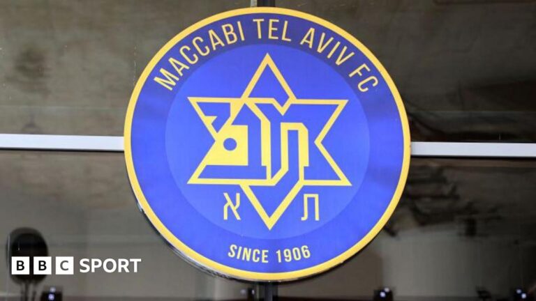 Maccabi Tel Aviv given suspended one-match away fan ban by Uefa for racist chant This picture shows the entrance of an official store of Israeli football team Maccabi Tel Aviv, at Bloomfield Stadium in Tel Aviv,