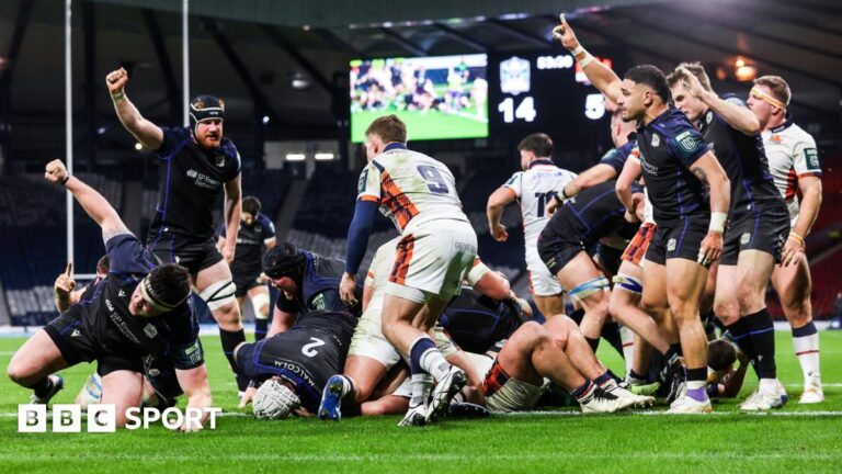 Glasgow celebrate scoring a try against Edinburgh at Hampden