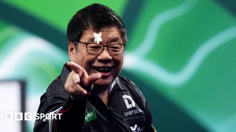 PDC World Championship 2026: Paul Lim, 71, on being oldest winner, darts in Asia and facing Luke Humphries Paul Lim throws a dart