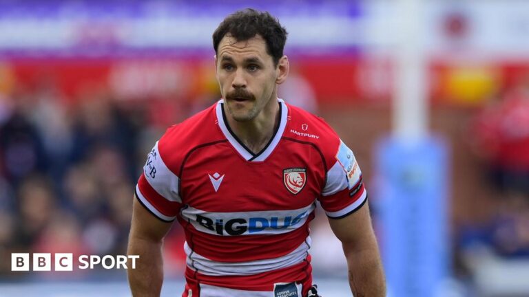 Tomos Williams: Wales and Gloucester scrum-half to play for Saracens next season Tomos Williams standing on the pitch during a match for Gloucester