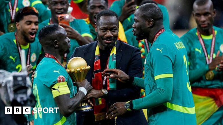 Pape Thiaw: Senegal manager given five-match ban after Afcon final chaos Pape Thiaw and the Senegal players celebrate with the trophy after winning the Africa Cup of Nations