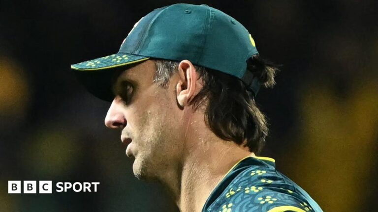 Mitchell Marsh looks on