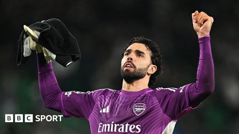 David Raya celebrates after Arsenal's 1-0 win at Sporting in the Champions League