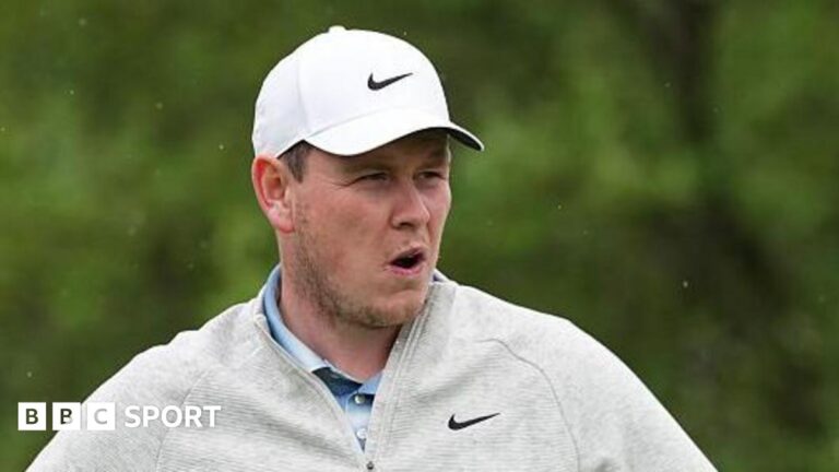 Texas Open: Robert MacIntyre misses out on title before Masters as JJ Spaun gets third win Robert MacIntyre in grey golf fleece and white cap during the final round of the Texas Open, with greenery in the background
