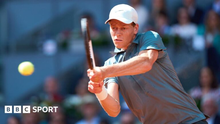 Jannik Sinner in action against Arthur Fils at the Madrid Open