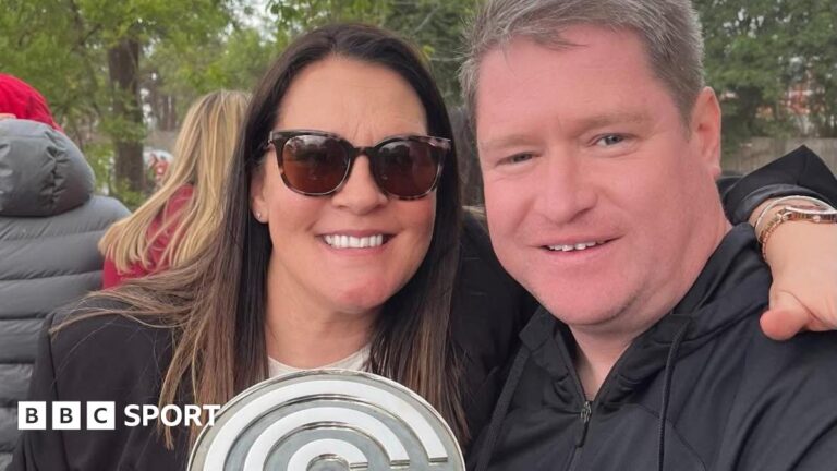 Matt Beard: Family calls for mandatory manager mental health checks after death Liverpool Women manager Matt Beard and his wife Debbie smile while celebrating the Reds' Championship title win