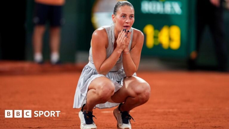 Marta Kostyuk crouches down with her hands on her face after completing victory over Elina Svitolina
