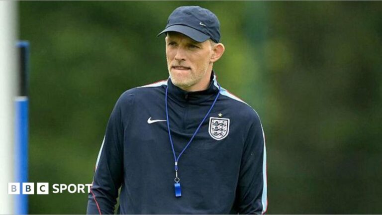 Thomas Tuchel wearing a baseball cap and England branded top during a training session at the World Cup