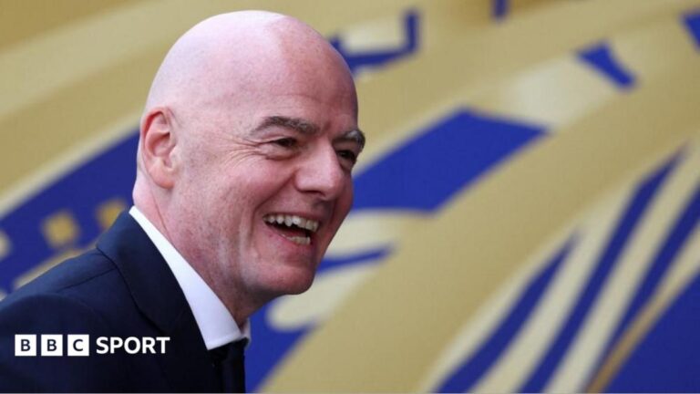 Fifa president Gianni Infantino smiles to the camera