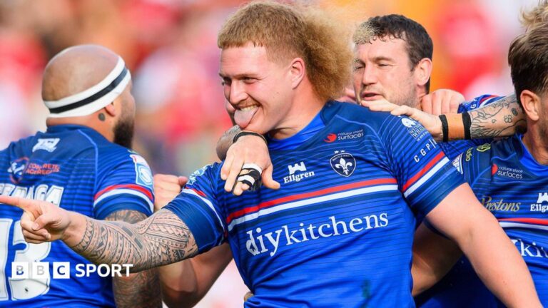 Caius Faatali celebrates scoring for Wakefield Trinity