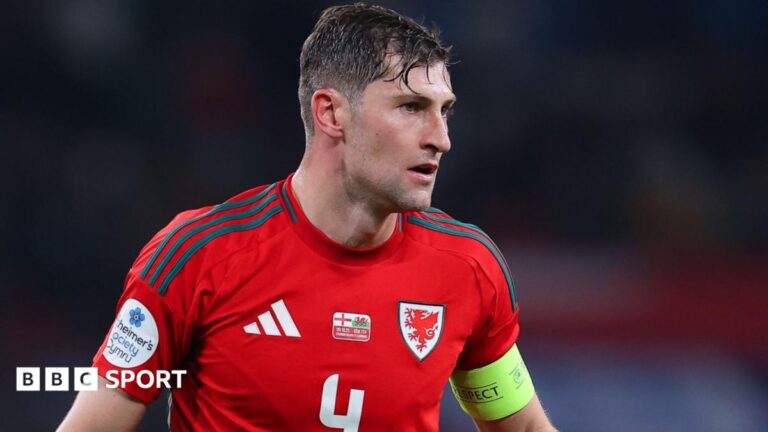 Ben Davies wearing the Wales captain's armband