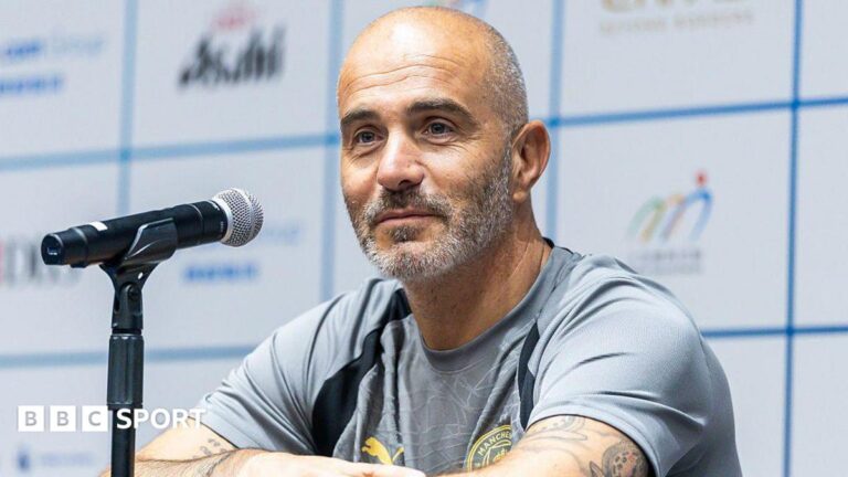 Head coach Enzo Maresca of Manchester City talks to media at the Kai Tak Stadium in Hong Kong, China