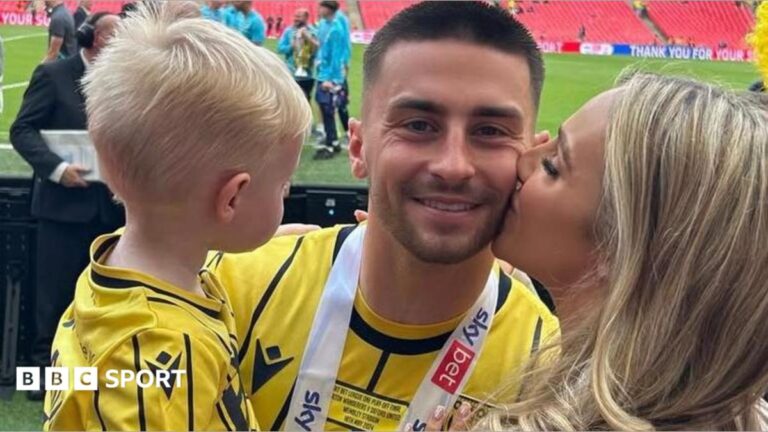 Jessica Beaumont pictured with her partner Owen Dale and their son Xavier when Oxford United secured promotion to the Championship