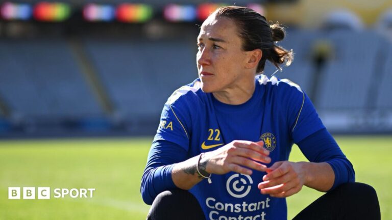 Women’s Super League: Lucy Bronze explains why she decided to stay at Chelsea Lucy Bronze in Chelsea kit sitting down on a football pitch
